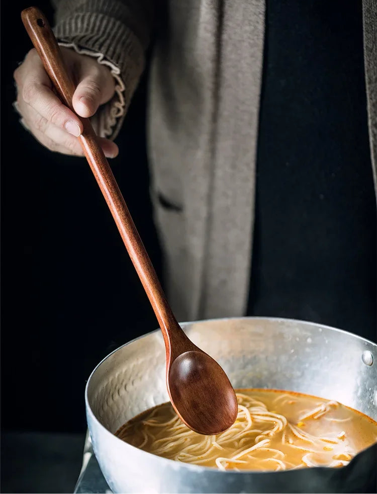 Long wooden stirring spoon