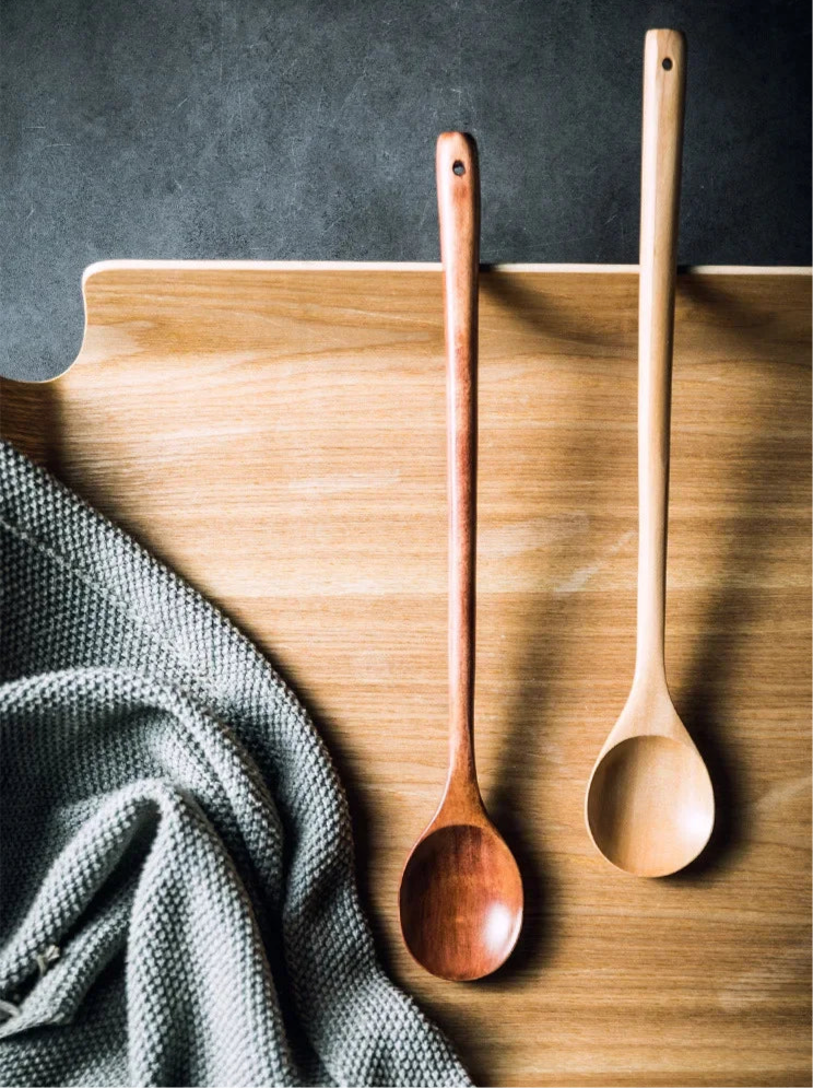 Long wooden stirring spoon