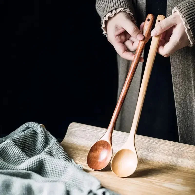 Long wooden stirring spoon